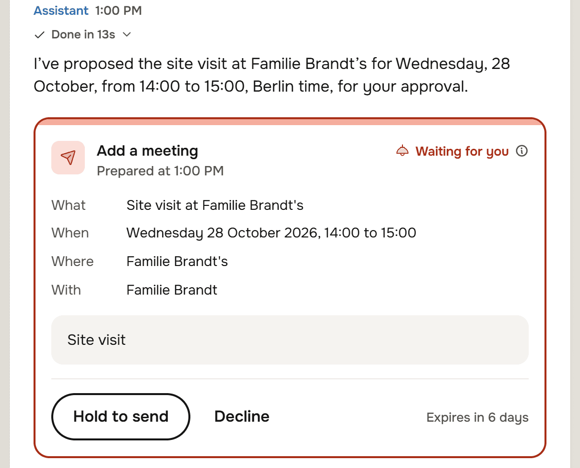 The Assistant's reply: I've proposed the site visit at Familie Brandt's for Wednesday, 28 October, from 14:00 to 15:00, Berlin time, for your approval. Under it a card, Add a meeting, Waiting for you, with What Site visit at Familie Brandt's, When Wednesday 28 October 2026, 14:00 to 15:00, Where Familie Brandt's, With Familie Brandt, and a note reading Site visit, Expires in 6 days.