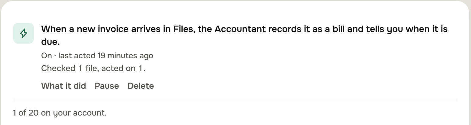 The When this happens screen with one rule: When a new invoice arrives in Files, the Accountant records it as a bill and tells you when it is due. Under it: On, last acted 19 minutes ago, Checked 1 file, acted on 1, and What it did, Pause, Delete. At the foot, 1 of 20 on your account.